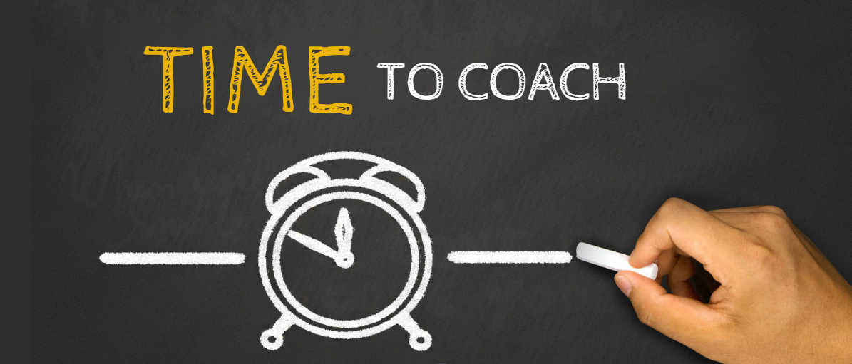 Chalk board with words "Time to Coach"